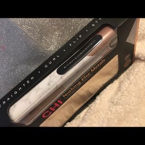 Two brand new in the box Chi straighteners